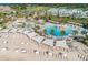 Aerial view of resort-style pool with beach access, lounge chairs, and shade structures at 3350 Seabrook Island Rd, Seabrook Island, SC 29455