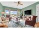 Gathering room features vaulted ceiling, a large TV, and comfortable seating at 3350 Seabrook Island Rd, Seabrook Island, SC 29455