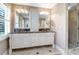Bathroom with double vanity, granite countertop, and a large shower at 3350 Seabrook Island Rd, Seabrook Island, SC 29455