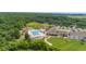 Aerial view of community pool and clubhouse with surrounding green space at 3350 Seabrook Island Rd, Seabrook Island, SC 29455