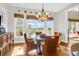 Breakfast nook with glass-top table and leather chairs, offering scenic views at 3350 Seabrook Island Rd, Seabrook Island, SC 29455