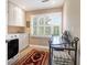 Convenient laundry room with washer, dryer, and ample cabinet storage at 3350 Seabrook Island Rd, Seabrook Island, SC 29455