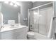 Clean bathroom with a white vanity, glass shower, and updated fixtures at 3350 Seabrook Island Rd, Seabrook Island, SC 29455