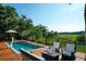Pool and deck with wicker furniture at 3350 Seabrook Island Rd, Seabrook Island, SC 29455