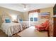 Cozy bedroom with twin beds, hardwood floors, and a relaxing sitting area at 3350 Seabrook Island Rd, Seabrook Island, SC 29455