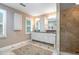 Bathroom with double vanity, granite countertop, and a large shower at 3350 Seabrook Island Rd, Seabrook Island, SC 29455