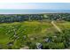 Aerial view of the property showing the neighborhood and marsh at 3350 Seabrook Island Rd, Seabrook Island, SC 29455