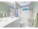 Well-appointed bathroom with a white vanity, shower/tub combo, and soft green walls at 3350 Seabrook Island Rd, Seabrook Island, SC 29455