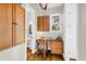 Bright home office features built-in cabinets and hardwood floors at 3350 Seabrook Island Rd, Seabrook Island, SC 29455
