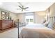 Main bedroom with large window, hardwood floors, and a ceiling fan at 3350 Seabrook Island Rd, Seabrook Island, SC 29455
