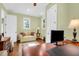 Spacious home office with hardwood floors and a comfortable sitting area at 3350 Seabrook Island Rd, Seabrook Island, SC 29455