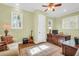 Bright home office features built-in shelving and hardwood floors at 3350 Seabrook Island Rd, Seabrook Island, SC 29455