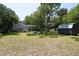 Large backyard with a shed, deck and seating area at 1302 E Ashley Ave, Folly Beach, SC 29439