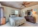Charming bedroom with a queen bed and wooden dresser at 1302 E Ashley Ave, Folly Beach, SC 29439