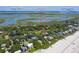 Aerial view showcasing home's location near the beach and lighthouse at 1302 E Ashley Ave, Folly Beach, SC 29439