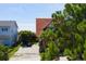 Aerial view of the house and surrounding neighborhood at 1302 E Ashley Ave, Folly Beach, SC 29439