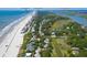 Property location shown with beach and Folly Downtown in the background at 1302 E Ashley Ave, Folly Beach, SC 29439