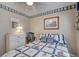 Nautical-themed bedroom with comfortable bedding and dresser at 1302 E Ashley Ave, Folly Beach, SC 29439