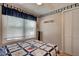 Bedroom with white closet doors and nautical decor at 1302 E Ashley Ave, Folly Beach, SC 29439