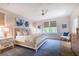 Spacious bedroom with a large bed, nightstands, and a comfortable sitting area at 3 38Th Ave, Isle of Palms, SC 29451