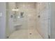 Large walk-in shower with marble tile and glass enclosure at 3 38Th Ave, Isle of Palms, SC 29451