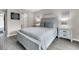 Serene bedroom with a queen bed and calming coastal decor at 202 Mariners Cay Dr, Folly Beach, SC 29439