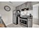 Modern kitchen featuring stainless steel oven and refrigerator at 202 Mariners Cay Dr, Folly Beach, SC 29439