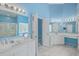 Bathroom with a double vanity, walk-in shower, and marble flooring at 802 Long Drive Rd, Summerville, SC 29485