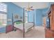 Bright bedroom with king-size bed, large windows, and ceiling fan at 802 Long Drive Rd, Summerville, SC 29485