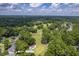 Aerial view highlighting property location near golf course and neighborhood at 802 Long Drive Rd, Summerville, SC 29485