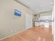 View of kitchen with white cabinets, hardwood floors, and granite countertops at 802 Long Drive Rd, Summerville, SC 29485