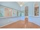 Spacious dining room with hardwood floors and view of kitchen at 802 Long Drive Rd, Summerville, SC 29485