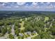 Aerial view of neighborhood with houses, trees, and a golf course at 802 Long Drive Rd, Summerville, SC 29485