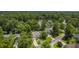 Aerial view of a house nestled in a lush, green neighborhood at 802 Long Drive Rd, Summerville, SC 29485
