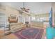 Open living room with vaulted ceiling, hardwood floors, and views of kitchen at 802 Long Drive Rd, Summerville, SC 29485