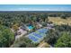 Community lap pool, tennis courts, and clubhouse visible from above at 802 Long Drive Rd, Summerville, SC 29485