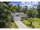 Single-Gathering home with a two-car garage and palm tree at 802 Long Drive Rd, Summerville, SC 29485