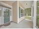 Front entrance with a glass door and brick flooring at 802 Long Drive Rd, Summerville, SC 29485