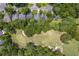 Aerial view showcasing a golf course and surrounding houses at 802 Long Drive Rd, Summerville, SC 29485