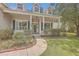 Inviting front porch with green shutters and walkway at 802 Long Drive Rd, Summerville, SC 29485