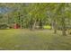 Wooded backyard with a privacy fence at 802 Long Drive Rd, Summerville, SC 29485