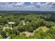Aerial view of the property and surrounding golf course and neighborhood at 802 Long Drive Rd, Summerville, SC 29485