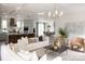 Open floorplan with living room, kitchen, and dining area at 1056 Capersview Ct, Awendaw, SC 29429