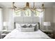Bright bedroom with plush bed and elegant decor at 1056 Capersview Ct, Awendaw, SC 29429