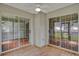 Bright, screened porch with sliding glass doors at 8300 Berringer Bluff Dr, Charleston, SC 29418