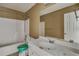 Simple bathroom with white vanity and bathtub at 8300 Berringer Bluff Dr, Charleston, SC 29418