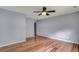 Spacious bedroom with hardwood floors and ceiling fan at 8300 Berringer Bluff Dr, Charleston, SC 29418