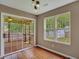 Dining room with hardwood floors and sliding glass doors leading to a deck at 8300 Berringer Bluff Dr, Charleston, SC 29418