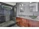 Modern bathroom with double sinks and walk-in shower at 8300 Berringer Bluff Dr, Charleston, SC 29418