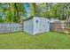 Large storage shed in backyard with double doors at 8300 Berringer Bluff Dr, Charleston, SC 29418
